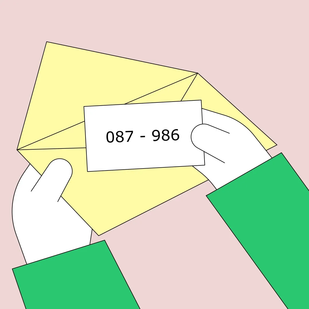 Closeup of hands opening an envelope